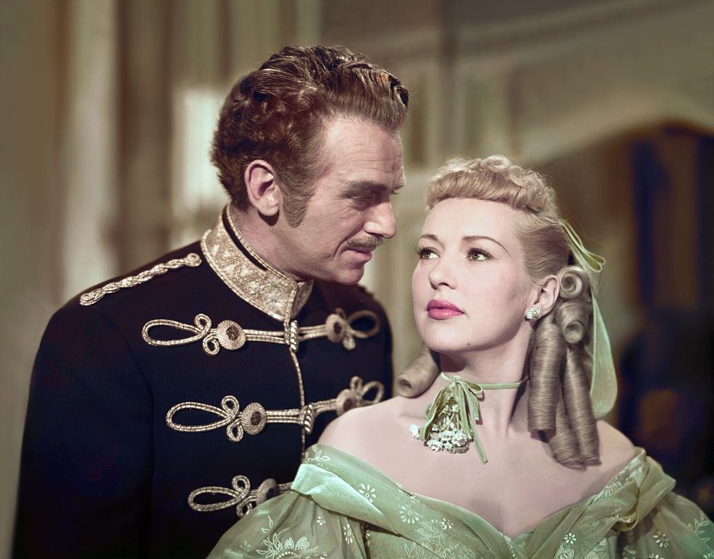 #47 Betty Grable with Douglas Fairbanks Jr. on the set of ‘That Lady in Ermine’, 1948.