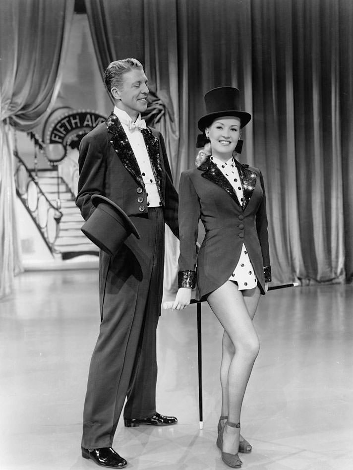 #57 Betty Grable with Dan Dailey in a scene from the film ‘Mother Wore Tights’, 1947.