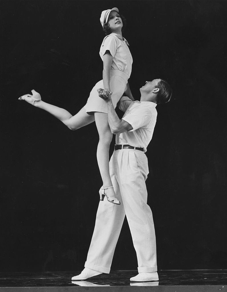 #23 Eleanor Powell and George Murphy dancing in a scene from the MGM musical ‘Broadway Melody of 1938’.
