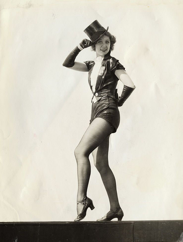 #9 Eleanor Powell finishes her ‘warmin’ up’ routine by strutting off the stage with a quizzical look.