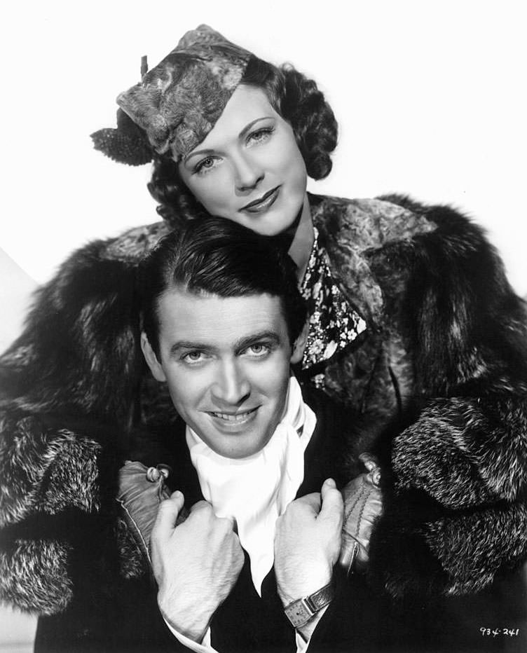 #73 Eleanor Powell has her arms around Jimmy Stewart in a scene from the film ‘Born To Dance’, 1936.