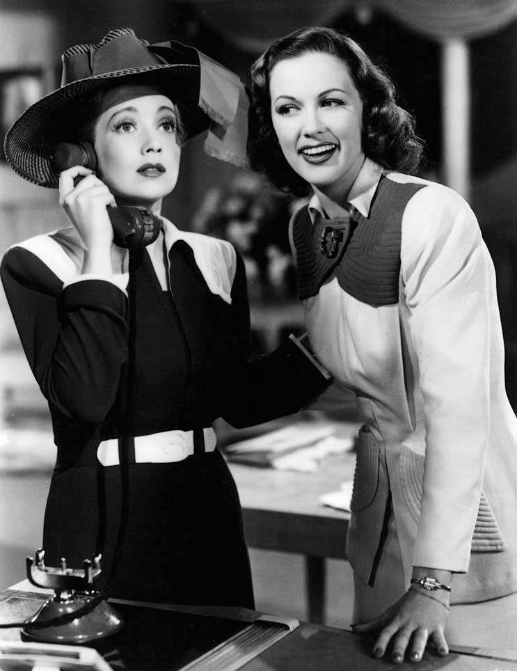 #45 Ann Sothern on the phone while Eleanor Powell listens in a scene from the film ‘Lady Be Good’, 1941.