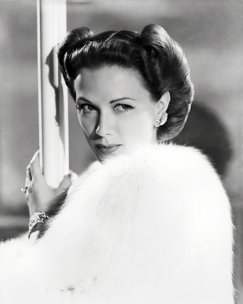 #48 Eleanor Powell wearing a wool coat, 1940.