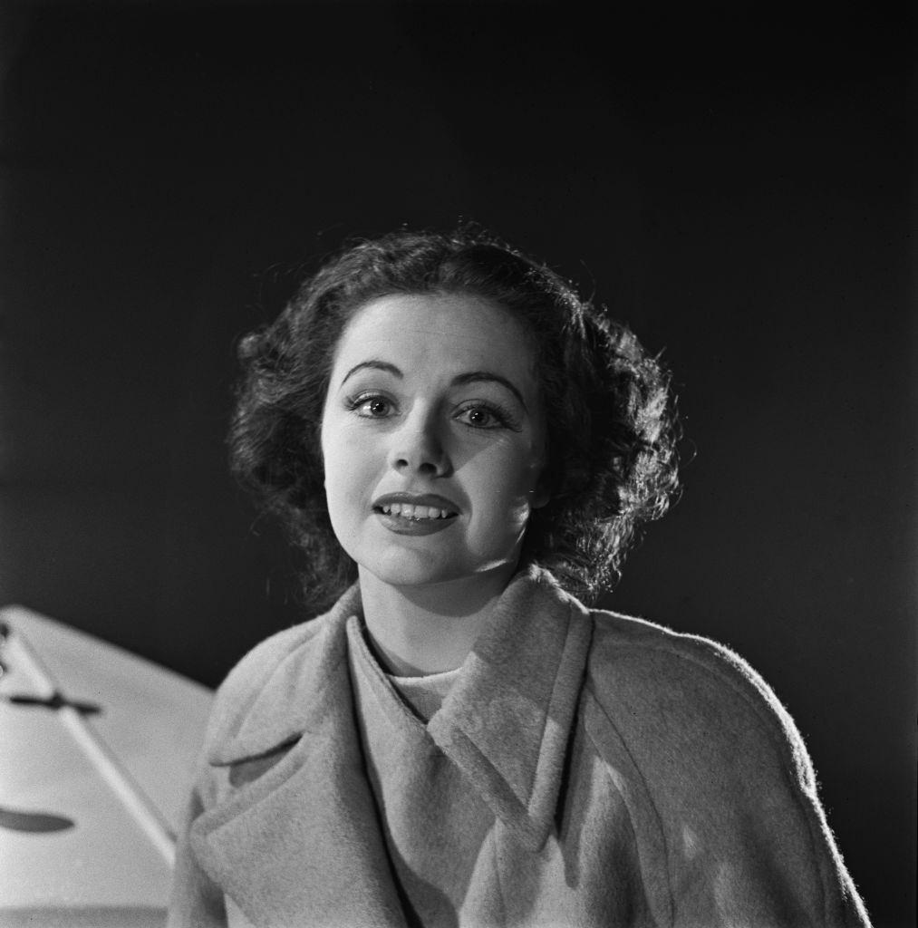 #19 Margaret Lockwood dressed in character as Anna Bomasch, during the shooting of a scene from the war thriller film ‘Night Train to Munich’, 1940.