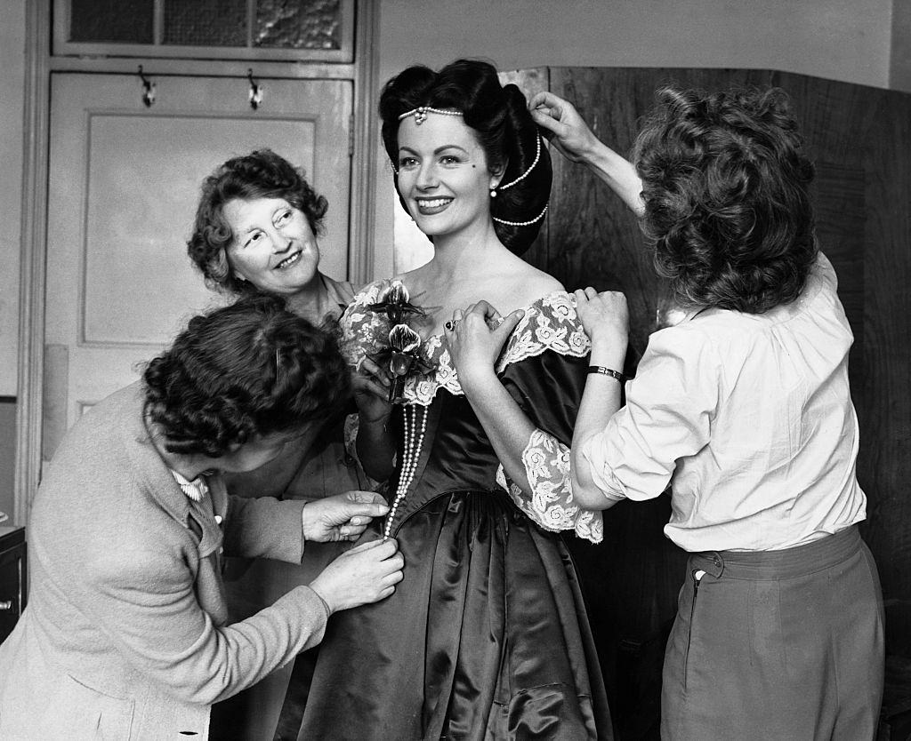 #40 Margaret Lockwood undergoes a costume fitting during the remaking of ‘The Wicked Lady’, 1945.