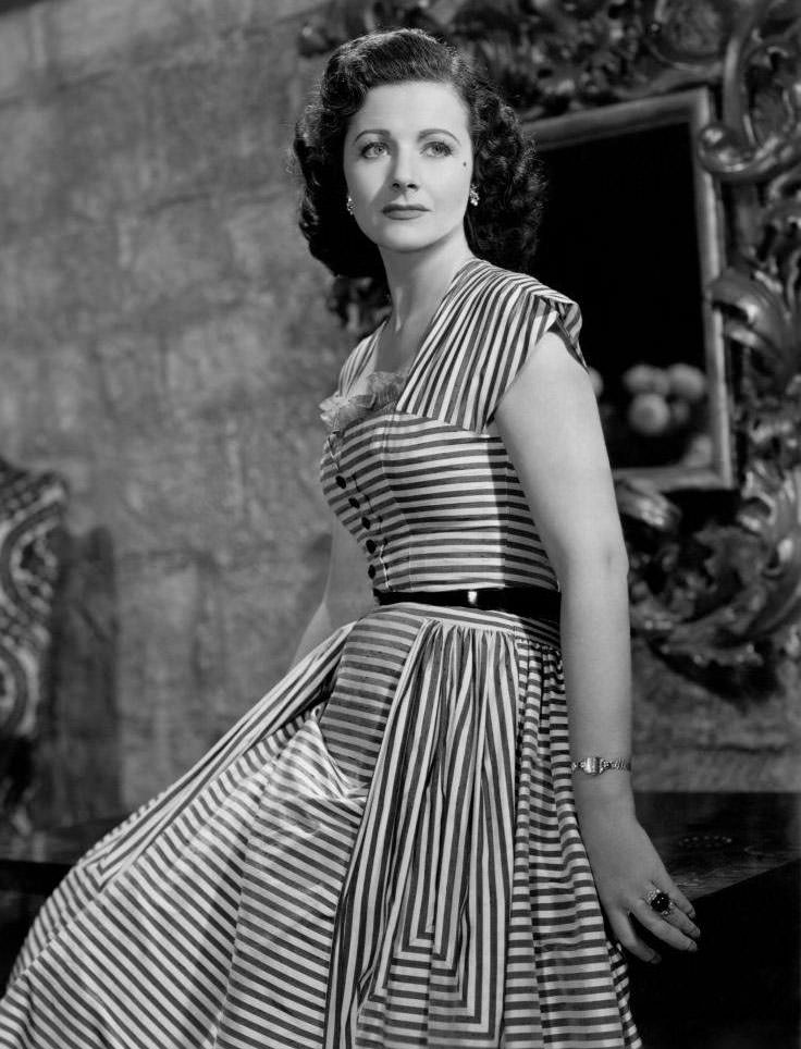 #74 Margaret Lockwood in ‘Trouble in the Glen’, 1954.