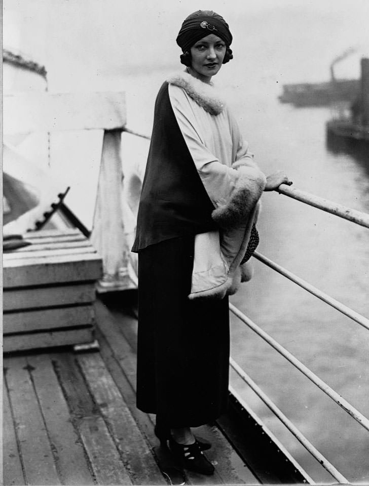#16 Natacha Rambova stands on the deck of the Paris as she sails to Europe on vacation. September 13, 1925.