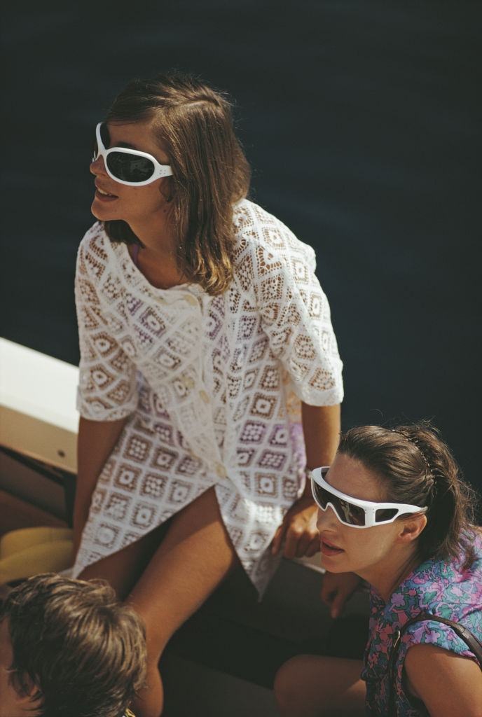 #23 Princess Margaret, Countess of Snowdon, wearing futuristic style sunglasses, on the Aga Khan’s yacht, Costa Smeralda, Sardinia, Italy, August 1967