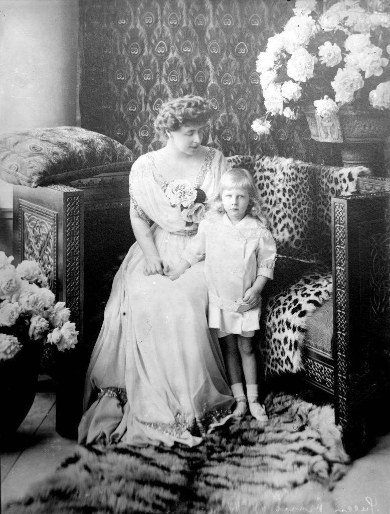 #12 Queen of Romania with her son Nicolas. Marie was the daughter of Alfred, the Duke of Edinburgh.