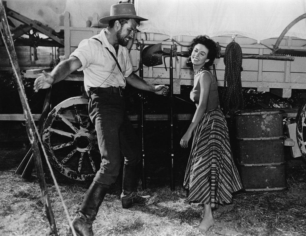 #24 Rita Moreno with Richard Egan in the movie ‘Untamed’, 1955.