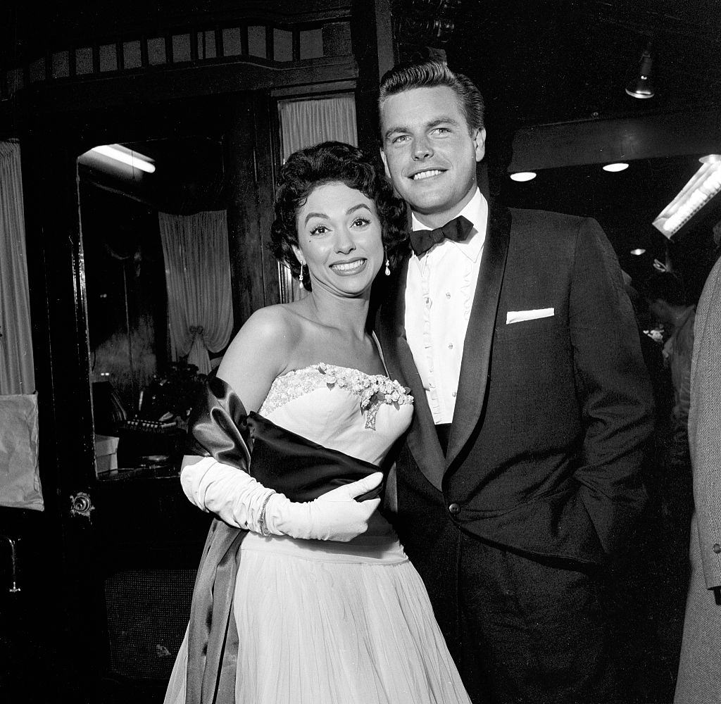 #25 Rita Moreno and Robert Wagner attend the movie premiere of “Grey Flannel Suit”, 1955.