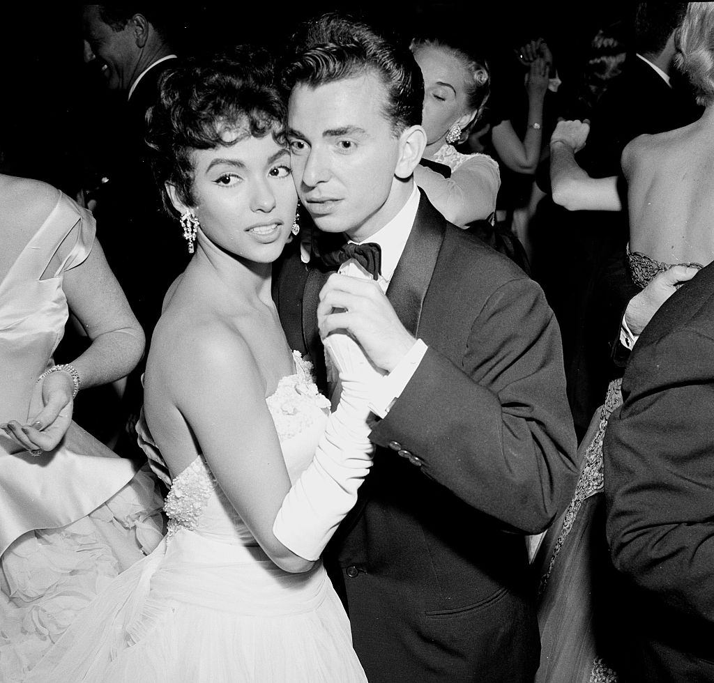 #35 Rita Moreno and Gene Nash attend a party in Los Angeles, 1955.