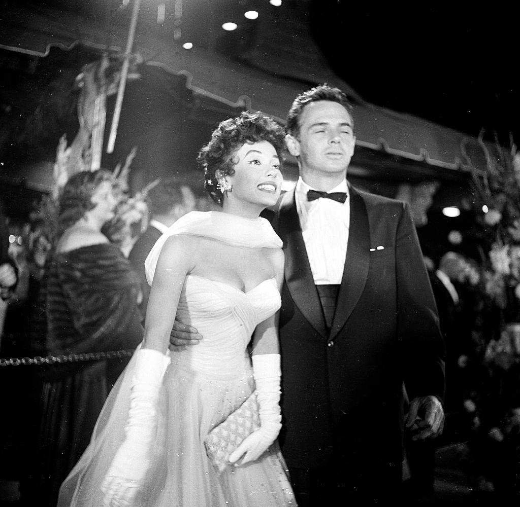 #40 Rita Moreno and John Hudson attend the movie premiere of the ‘Egyptian’, 1954.