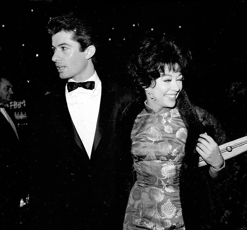 #52 Rita Moreno and George Chakiris attend an event in Los Angeles, 1961.