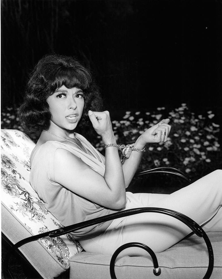 #60 Rita Moreno in handcuffs in a scene from the television series ‘Burke’s Law’, 1963