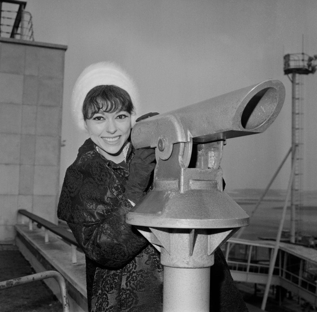 #68 Rita Moreno at Heathrow Airport, London, 1963.
