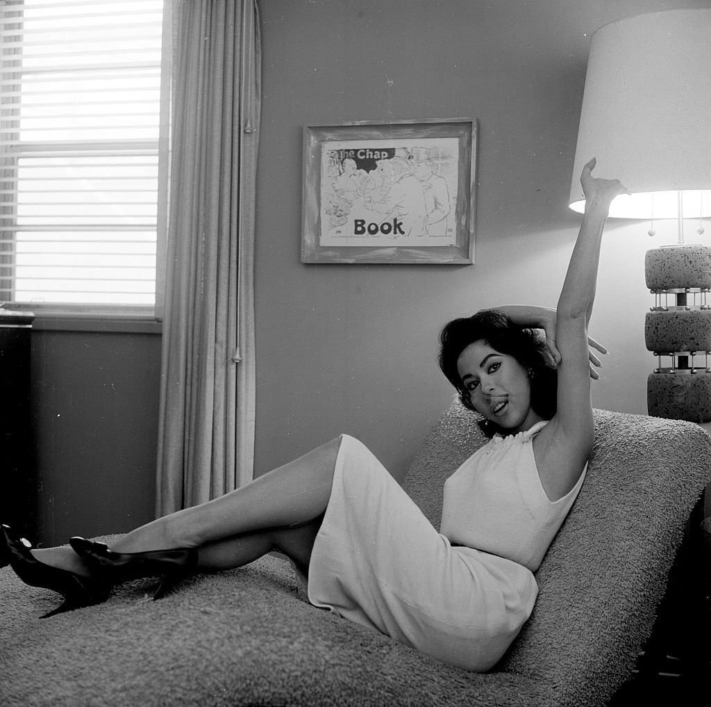#72 Rita Moreno at her home in Los Angeles, 1964.