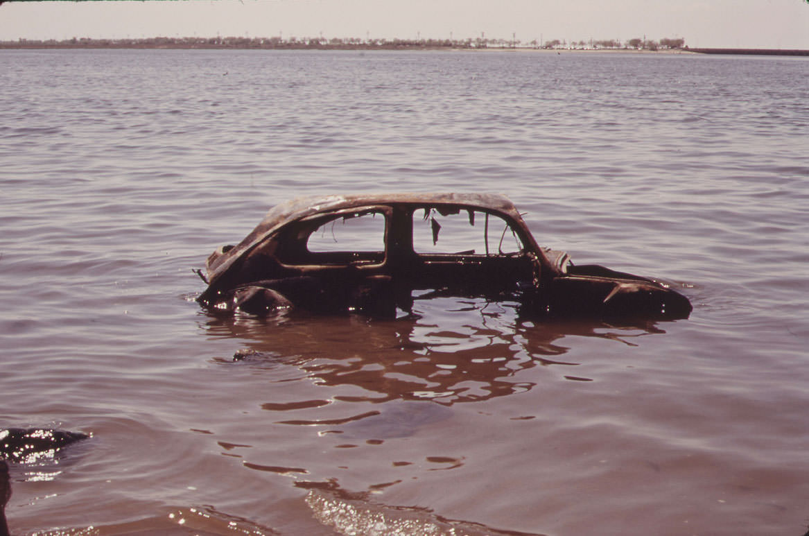 #3 Abandoned Car in Jamaica Bay – June 1973 by Arthur Tress