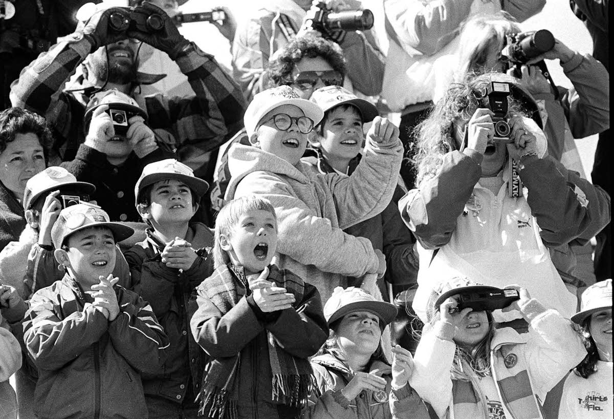 #12 Classmates of Christa McAuliffe’s son cheer as the Challenger launches skyward.