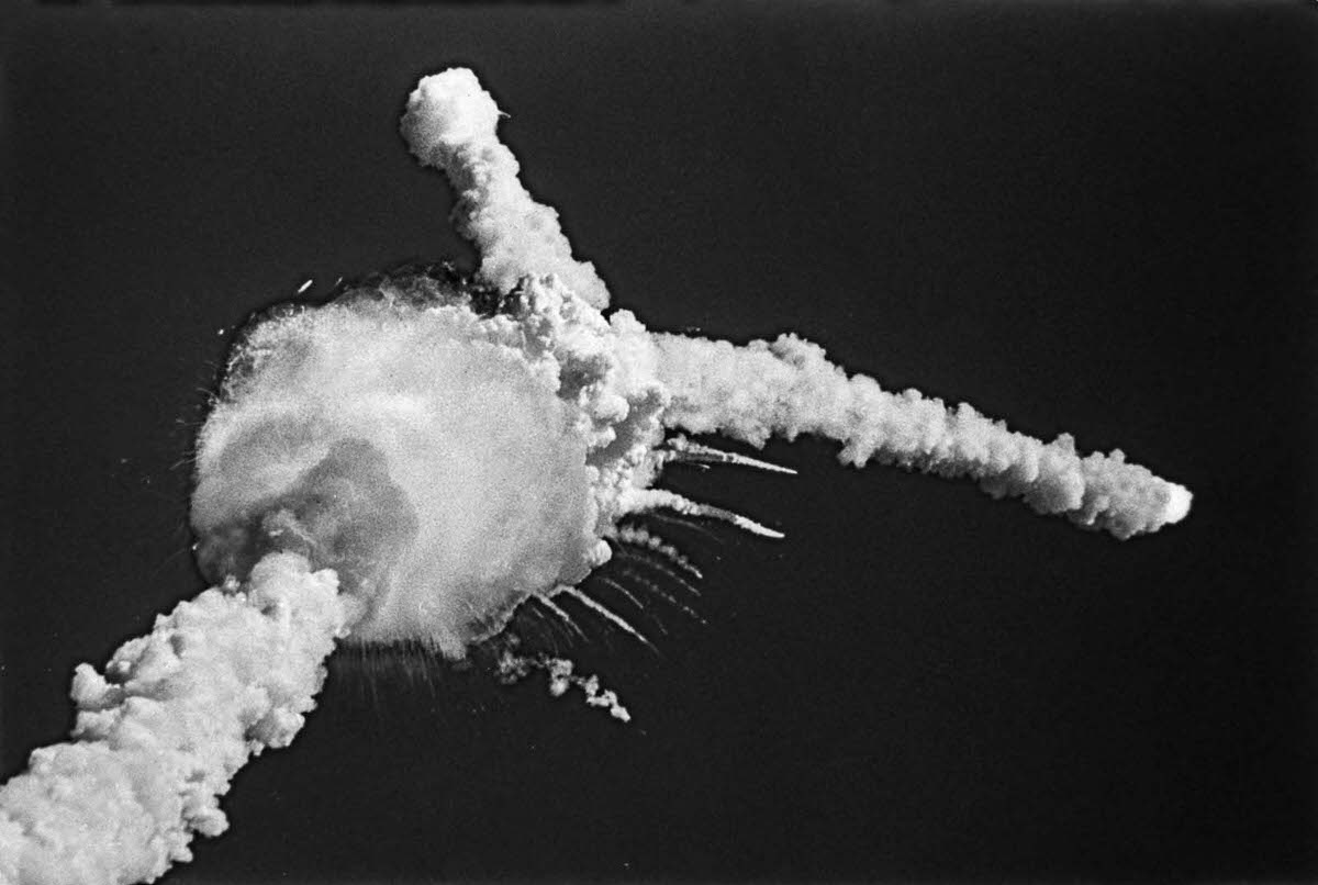 #13 The Challenger explodes 73 seconds into flight, nine miles above the Atlantic Ocean.