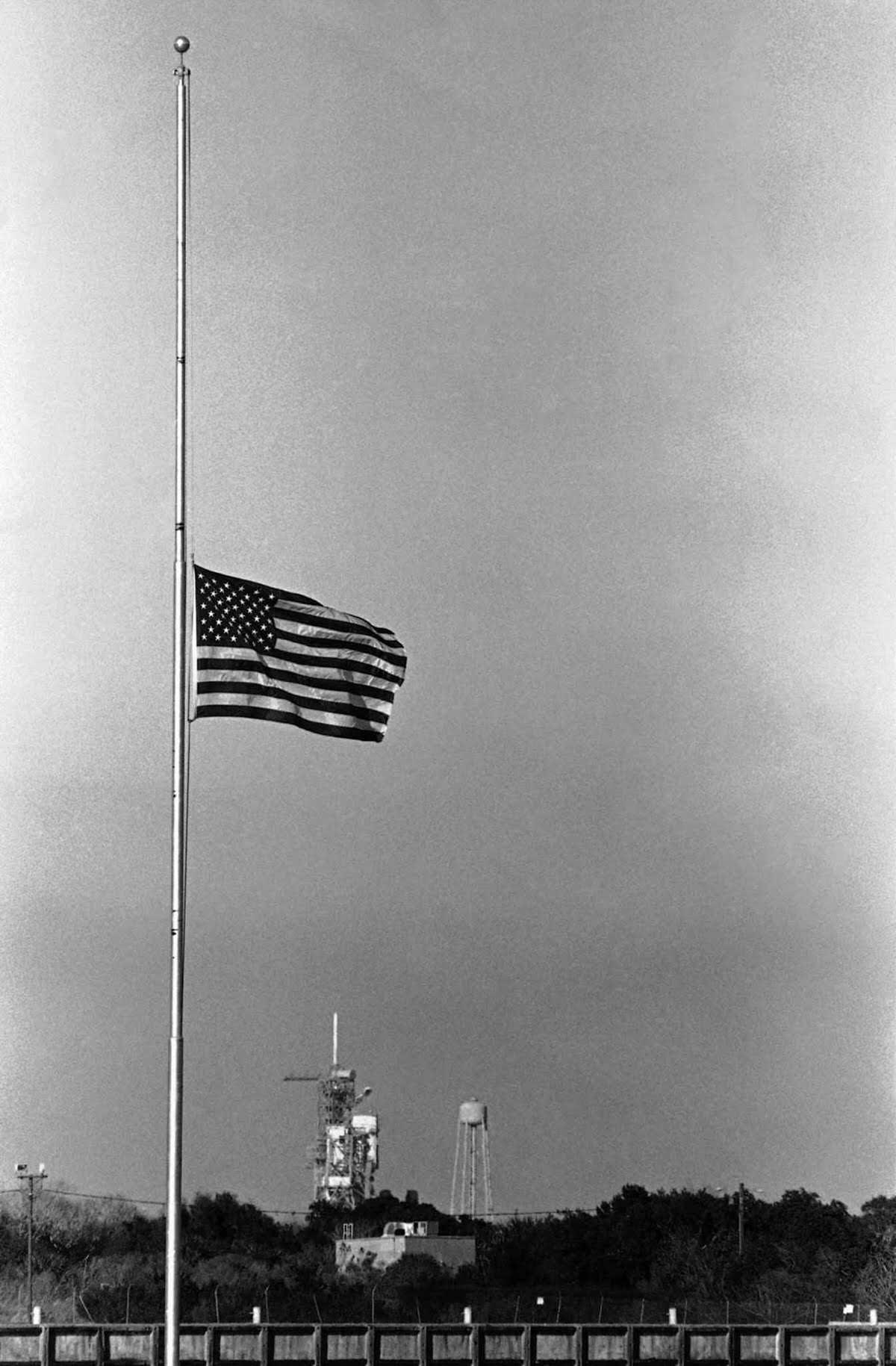 #19 A flag flies at half-mast at Kennedy Space Center after the explosion.