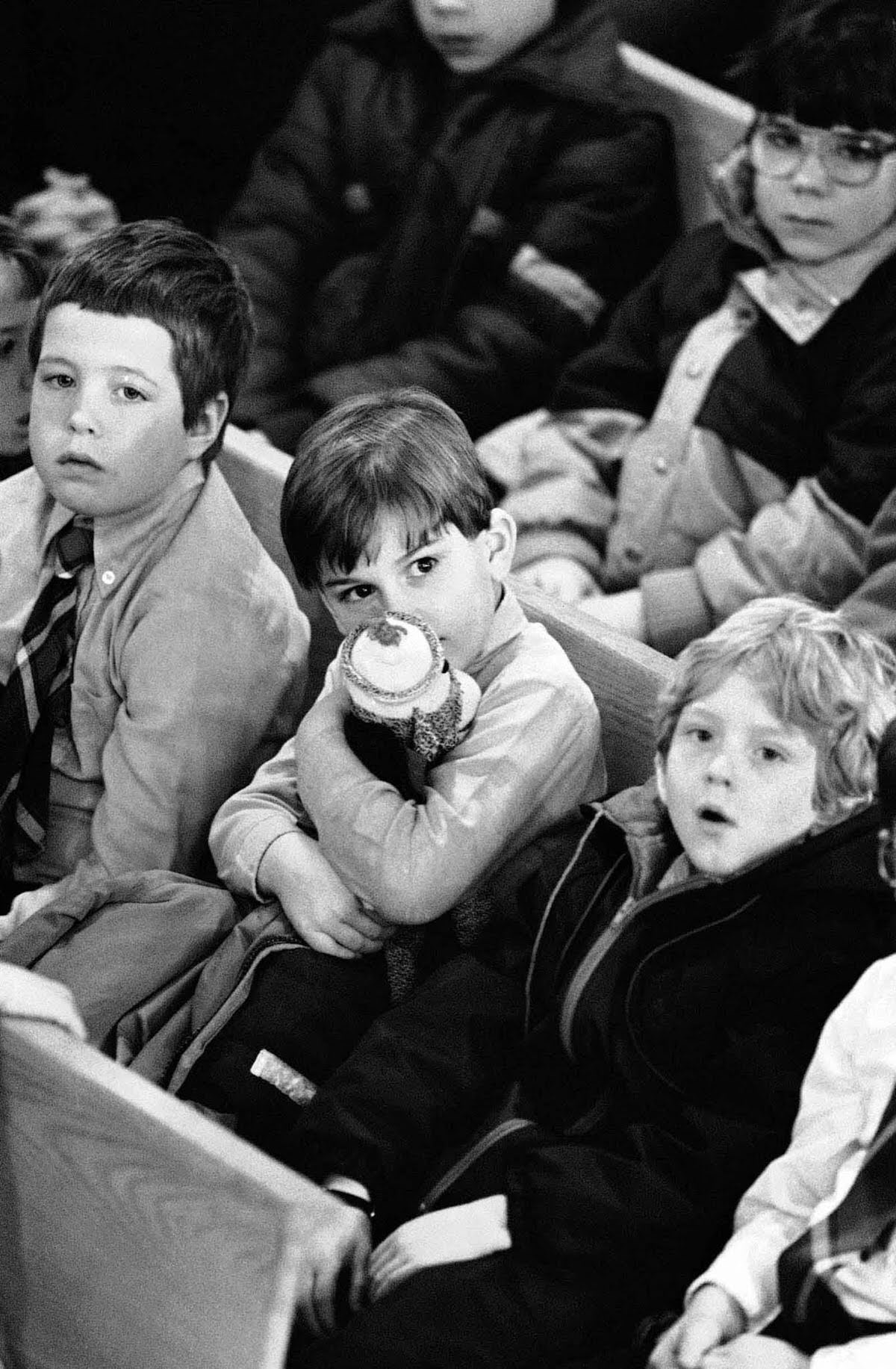 #20 Children attend a memorial service for Christa McAuliffe at a church in Concord, New Hampshire.