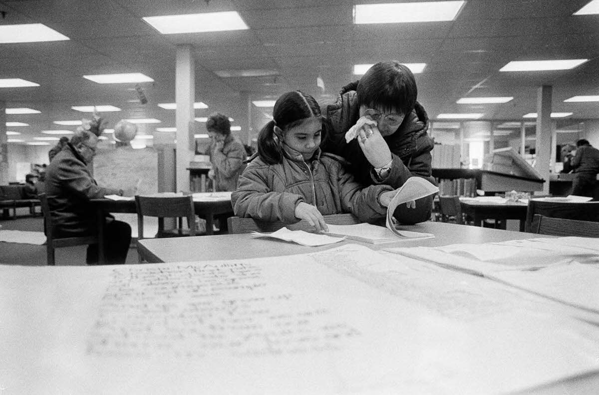 #25 Lisa Mitten wipes tears from her eyes as her daughter Jessica reads some of the letters of sympathy from around the country on display at Concord High School.
