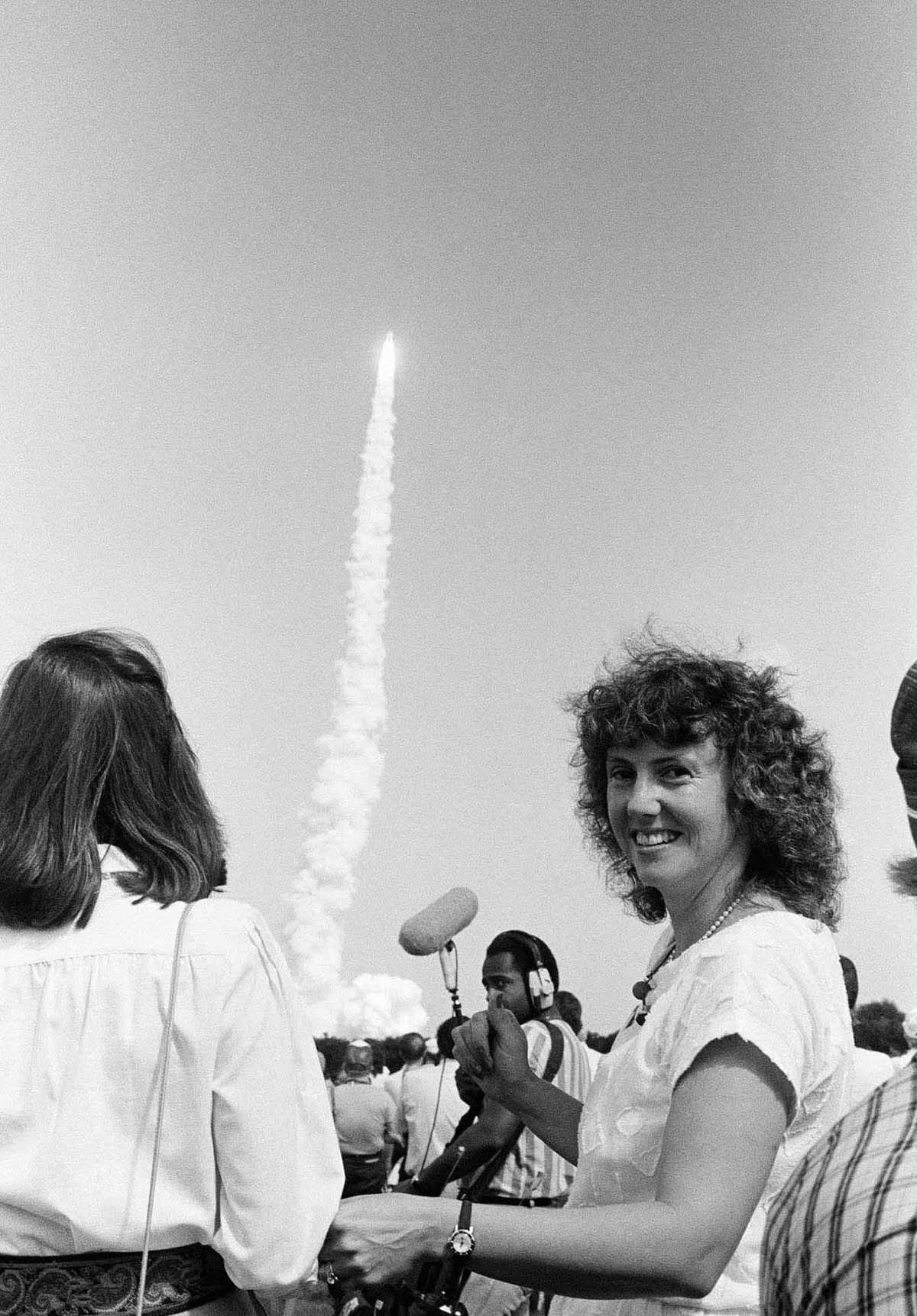 #6 Christa McAuliffe watches a successful launch of the space shuttle Challenger after being selected to join a later mission. Oct. 30, 1985.