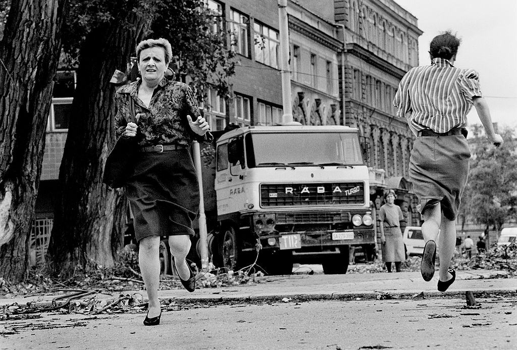 Women run for their lives across ‘Sniper Alley’ under the sights of Serb gunmen during the siege of Sarajevo.