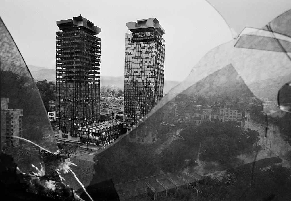 The burnt out tower blocks of Sarajevo’s financial district seen through the shattered windows of the Holiday Inn Hotel.