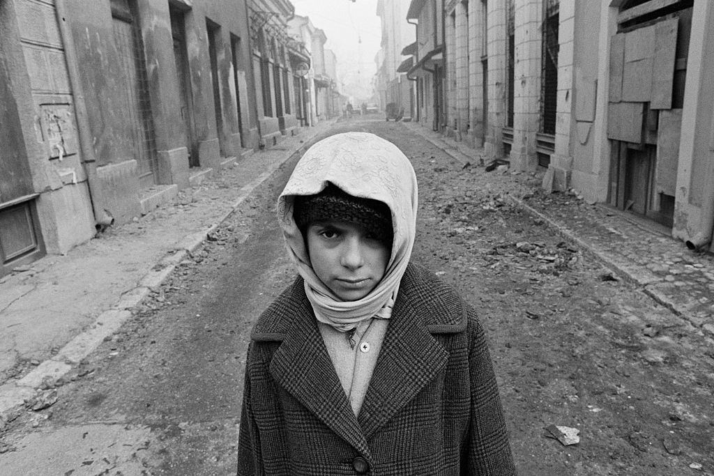 Mirza Mangajic, a 10-year-old Muslim boy, survives in Sarajevo’s Old Town quarter with his grandmother, 1993.