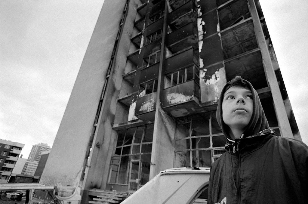 A boy in the area known as Heroes Square, so called because of the extreme dangers of living there during the war, 1994.