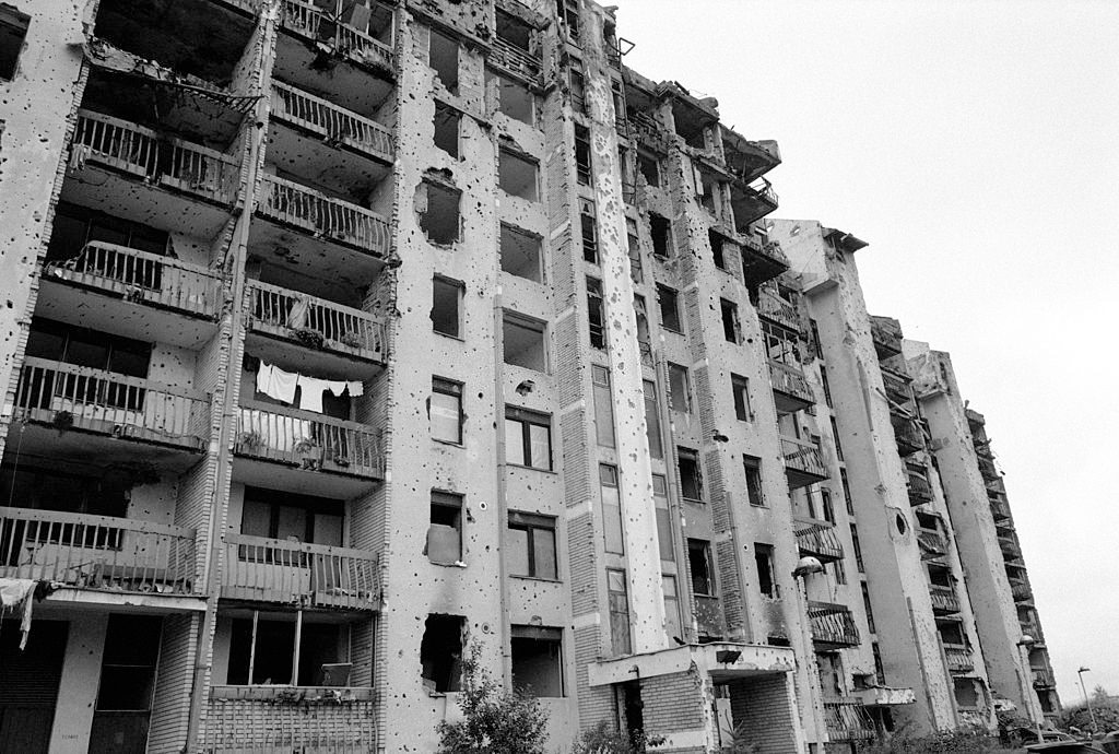 The first signs of rebirth and rebuilding as washing hangs on the balcony of a shell damaged apartment block on Sarajevo’s frontline.