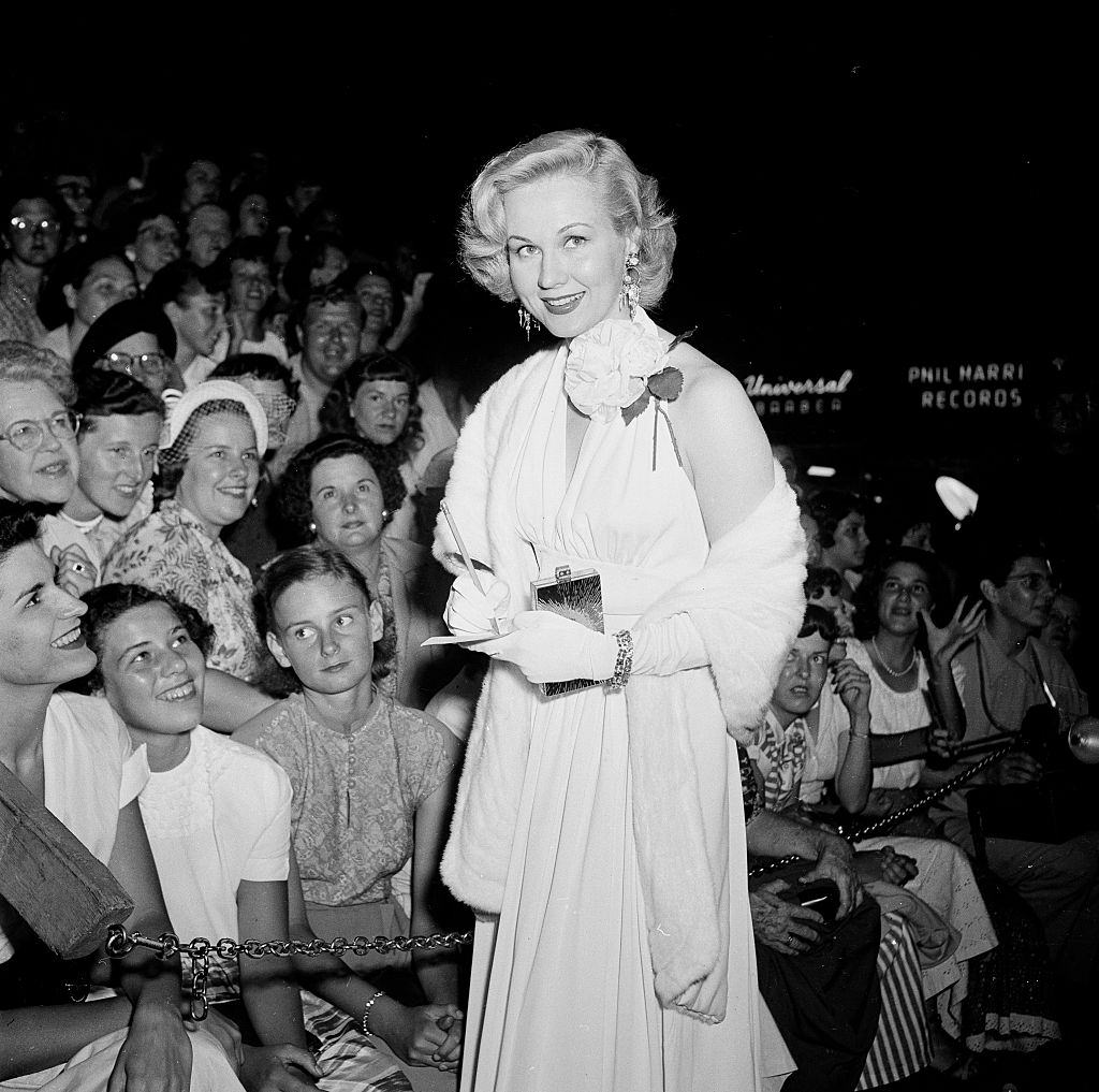 #16 Virginia Mayo attends a premiere in Los Angeles, 1951.