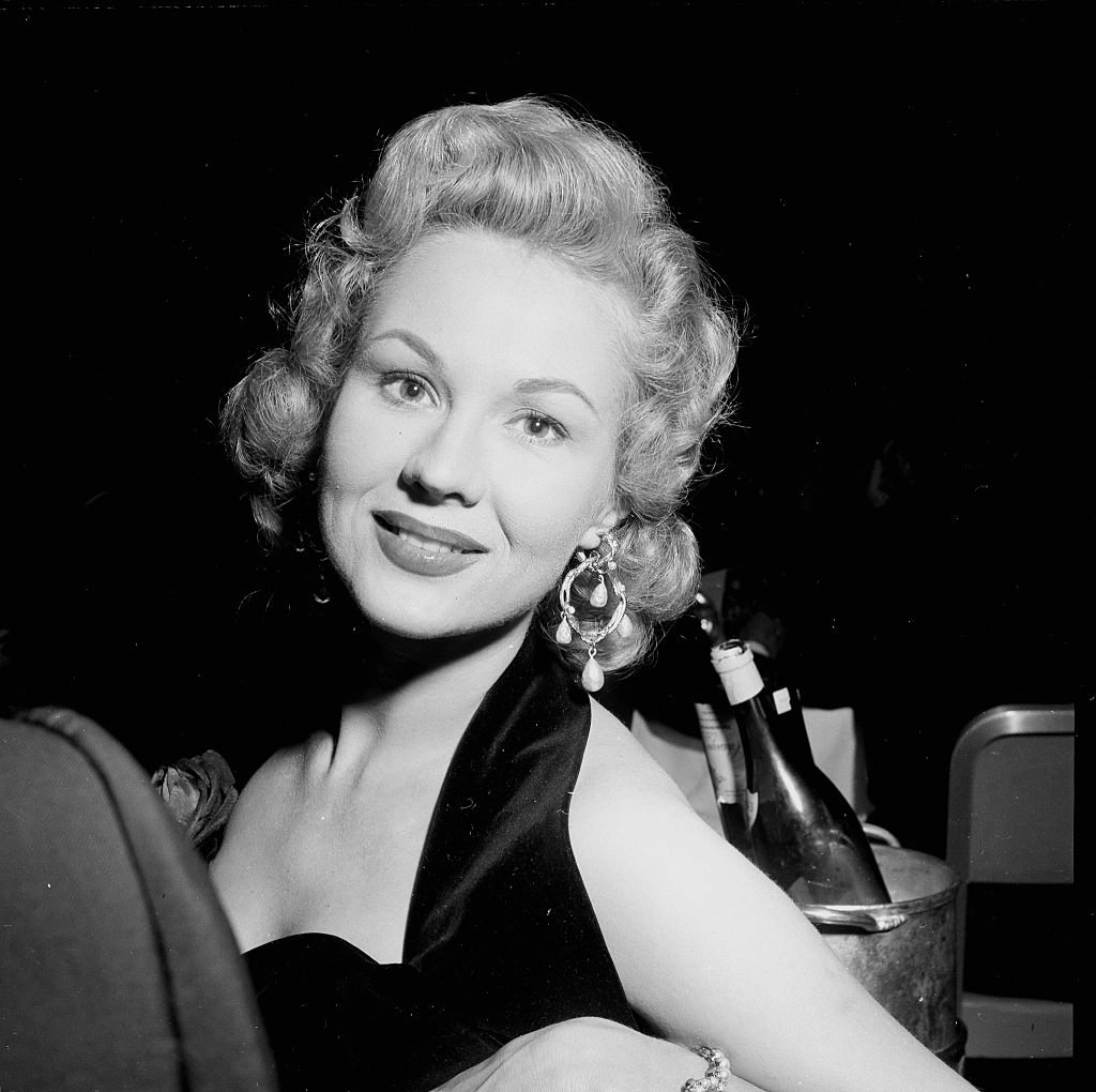 #18 Virginia Mayo poses at a party in Los Angeles, 1954.