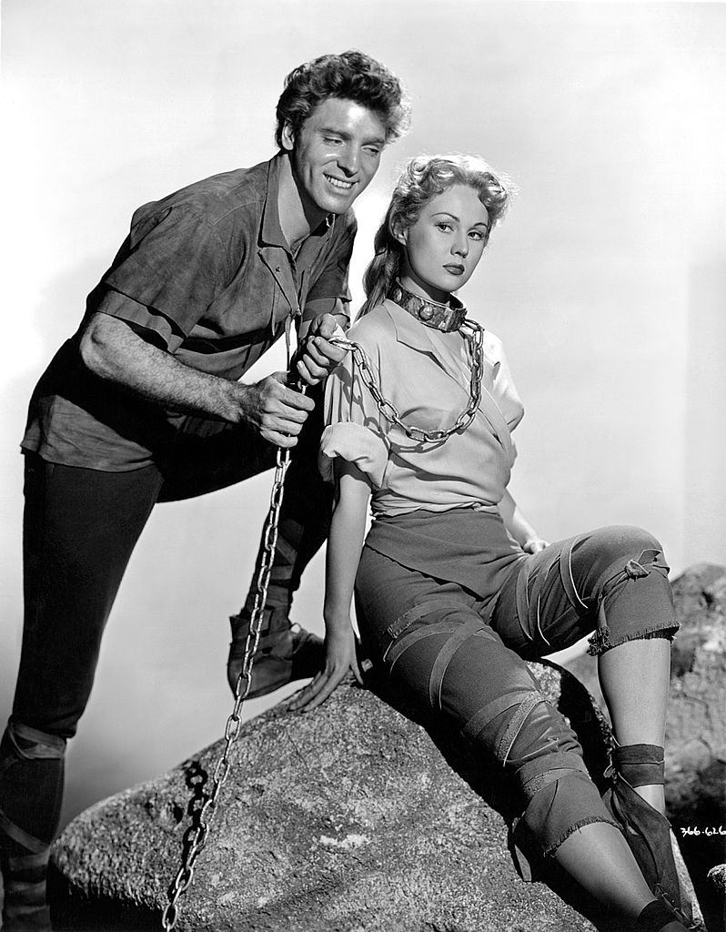 #2 Burt Lancaster ties up Virginia Mayo with a chain in a scene from the movie ‘The Flame and the Arrow’, 1950.