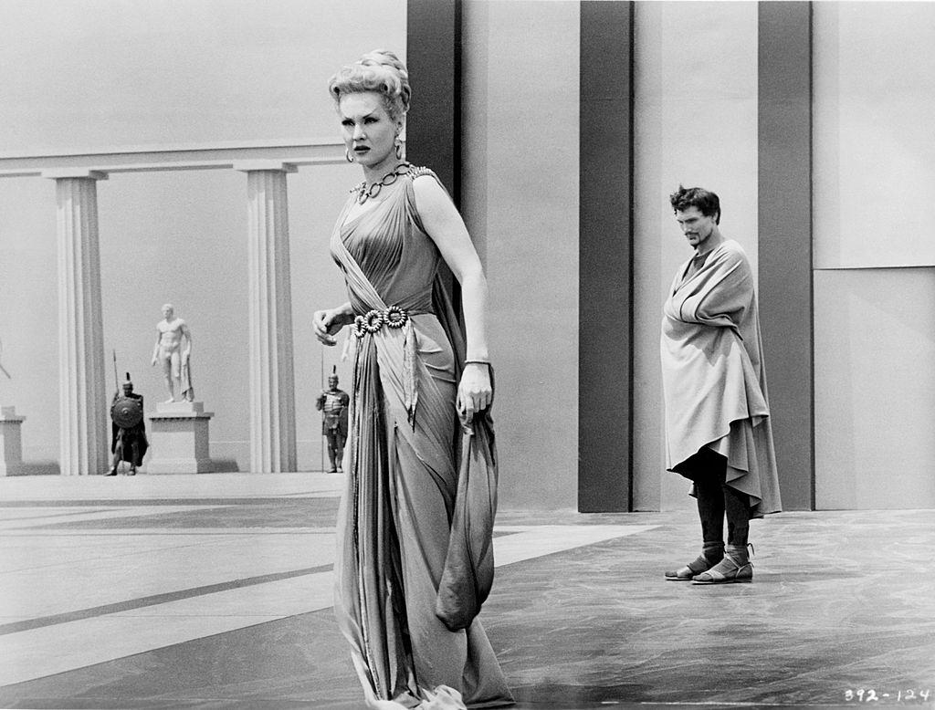 #45 rginia Mayo and Jack Palance in typical ancient Greek dress in a scene from the movie ‘The Silver Chalice’, 1954.