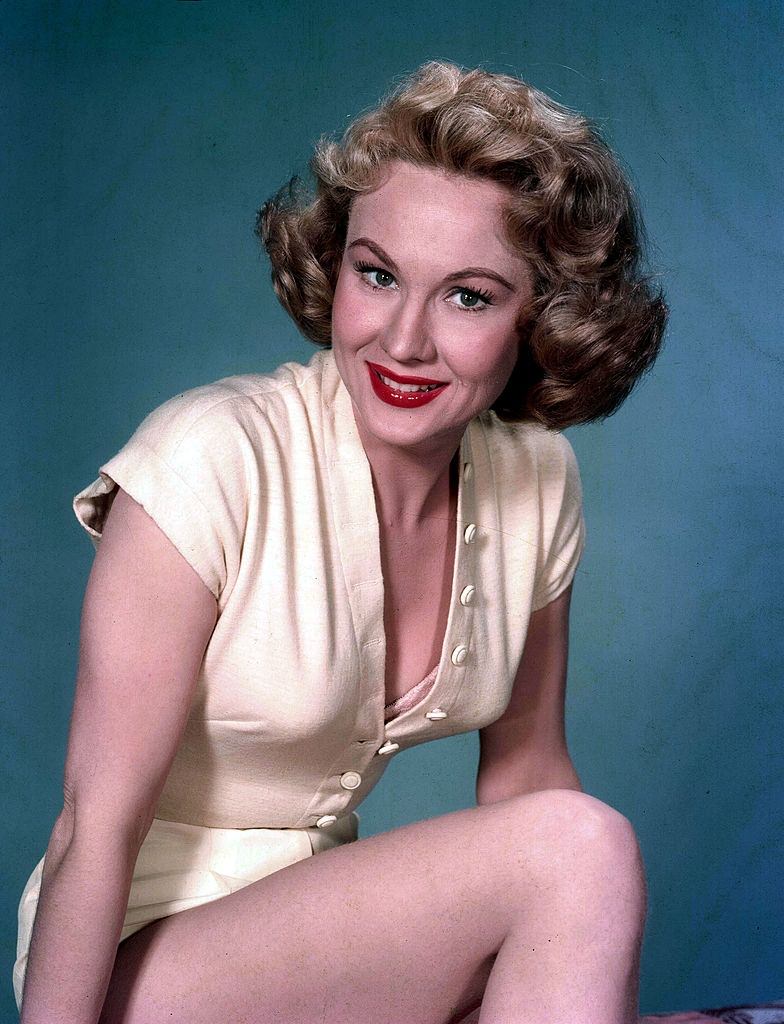 #10 Virginia Mayo wearing yellow outfit, Portrait, 1955.