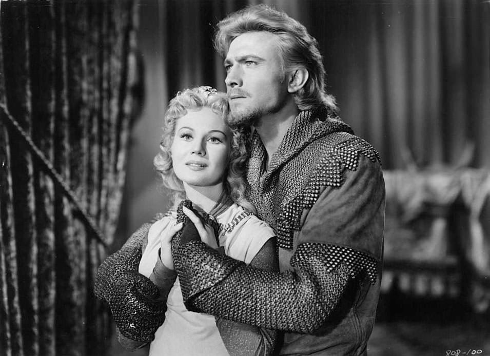 #68 Laurence Harvey holding onto Virginia Mayo in a scene from the film ‘King Richard And The Crusaders’, 1954.