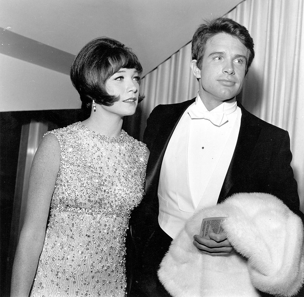 #18 Warren Beatty with her sister Shirley MacLaine at a movie premiere on April 18, 1966
