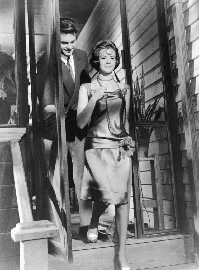 #4 Warren Beatty with Natalie Wood walk through a doorway in a still from the film, ‘Splendor In The Grass,’ 1961.