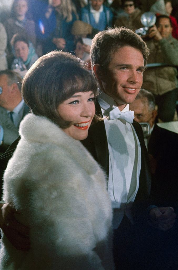#47 Warren Beatty with her sister Shirley Maclaine at the April 18th Academy Awards presentation, 1966.