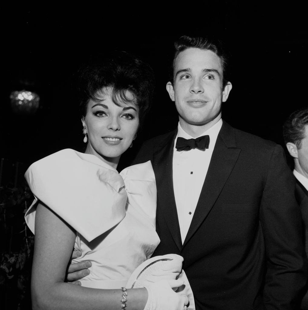 #14 Warren Beatty and actress Joan Collins attend a party in Los Angeles, 1959.