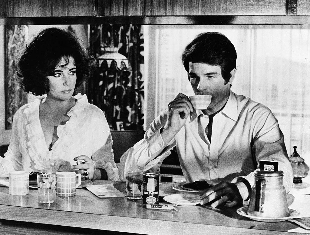 #63 Warren Beatty with Elizabeth Taylor in the movie ‘The only Game in town’, 1969.