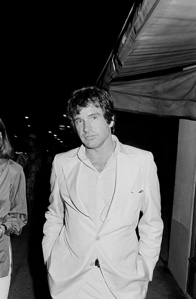 #69 Warren Beatty with Elizabeth Taylor in the movie ‘The Only Game in Town’, 1970.