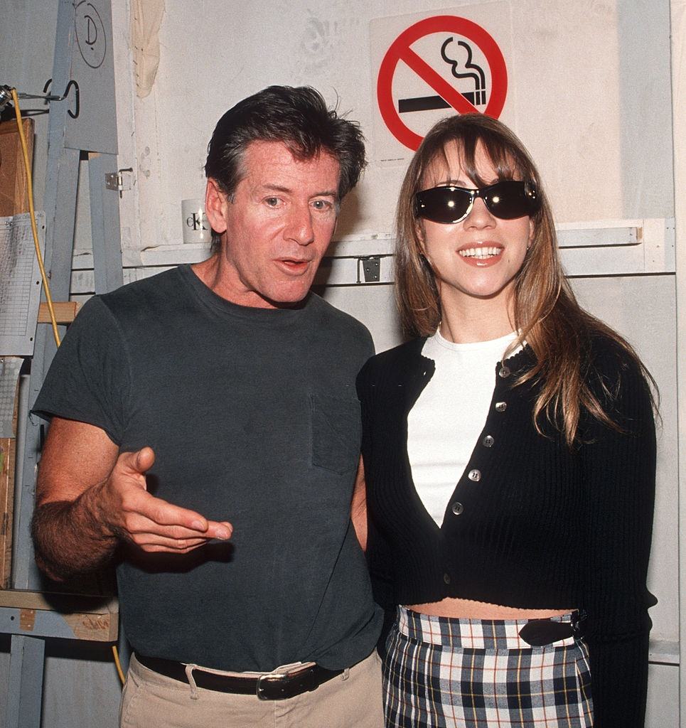 #66 Mariah Carey with Calvin Kelin, 1994.