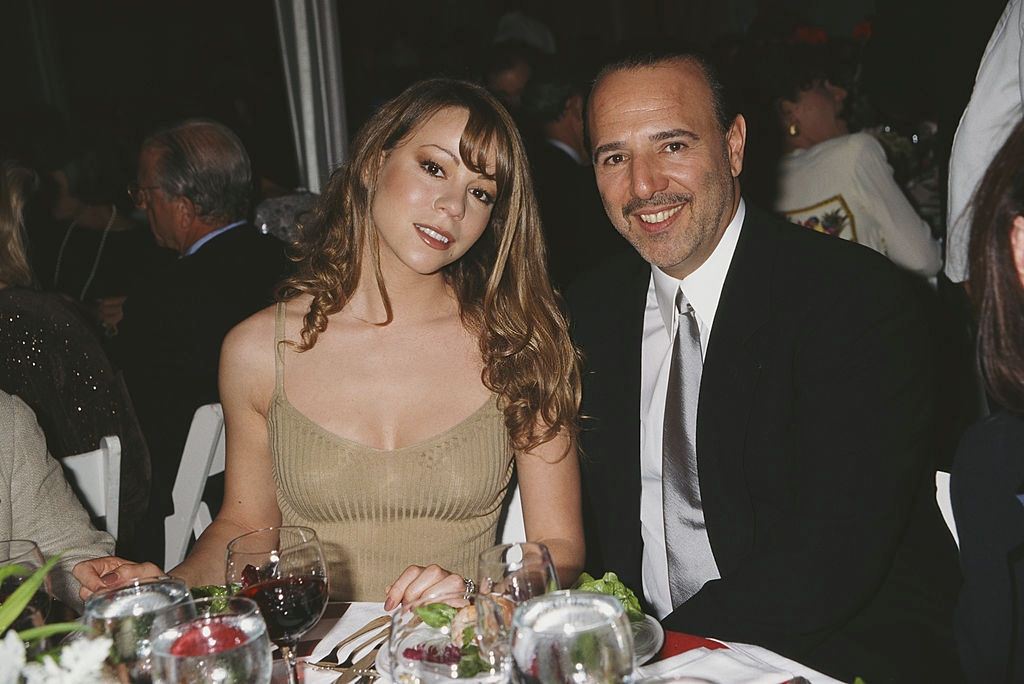 #69 Mariah Carey with her husband Tommy Mottola, 1995.