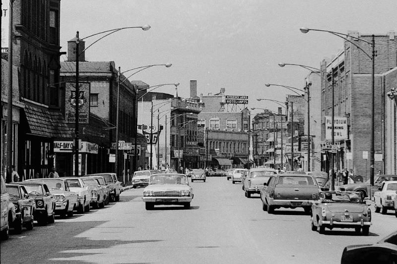 #41 On the right beneath the Playdium Parking Bowl sign, was originally the entrance to the Covent Theatre.