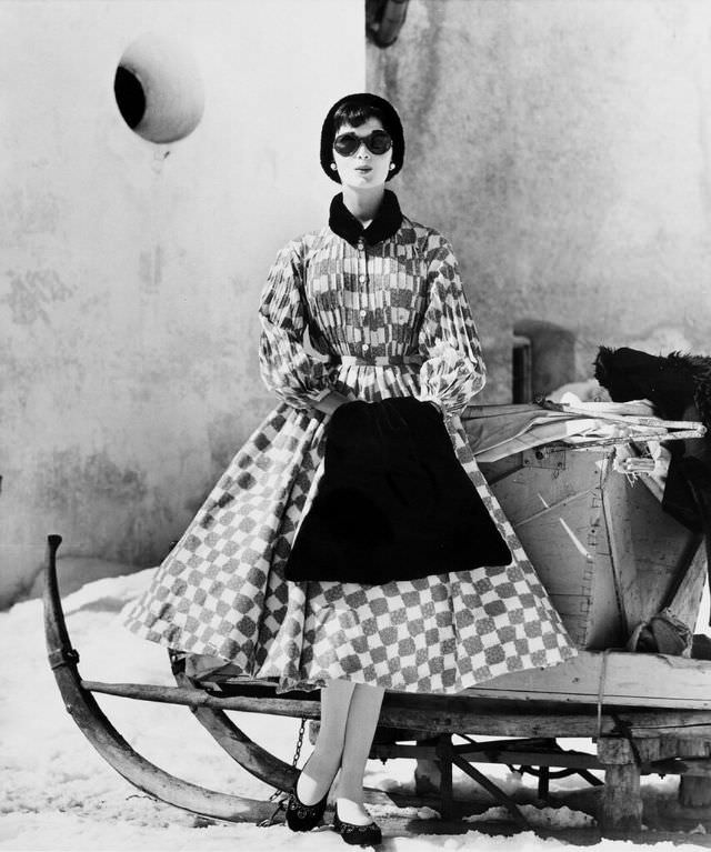 #40 Model is wearing a dress by Bessie Becker, photo by Regina Relang, 1957