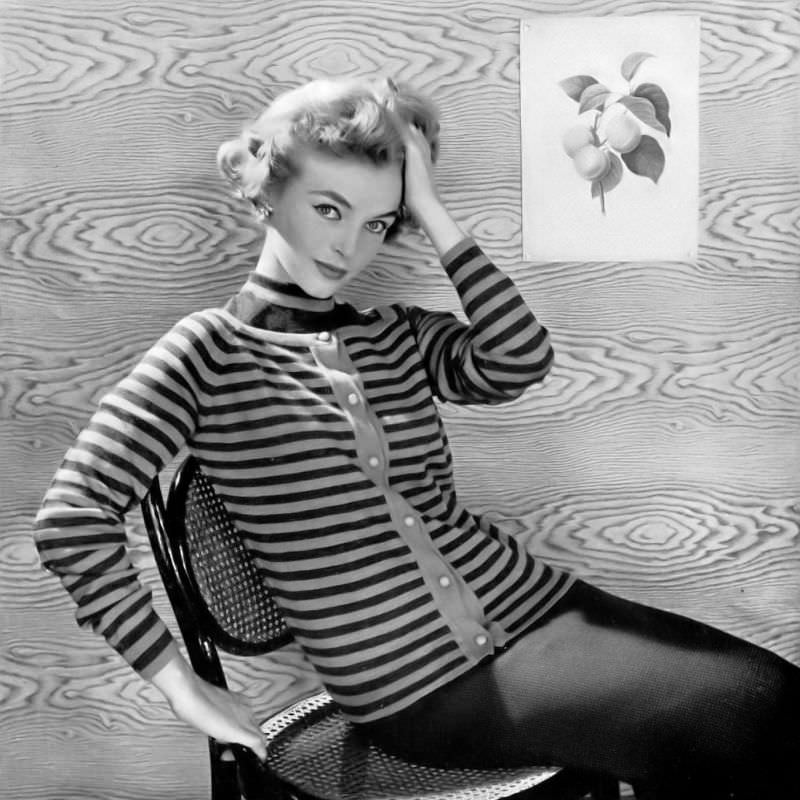 #15 Joan Olson in sporty twin-set of gray and green stripes by Korrigan Lesur, 1953